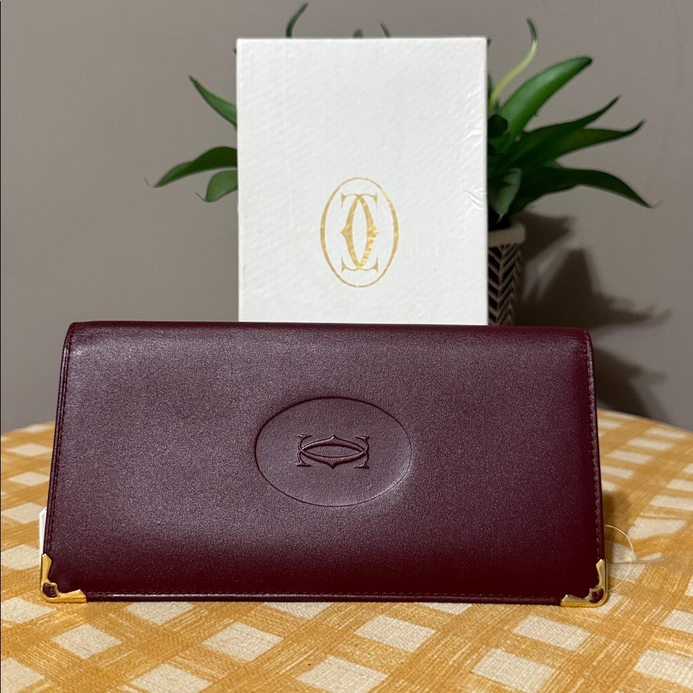 Cartier Burgundy Leather Wallet with Gold Details